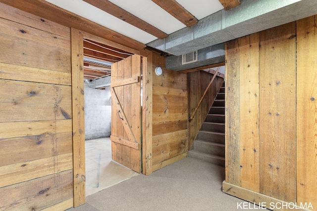 226 Palms St SW, Grand Rapids, MI 49548 - finished below grade area featuring wood walls, stairs, and carpet flooring