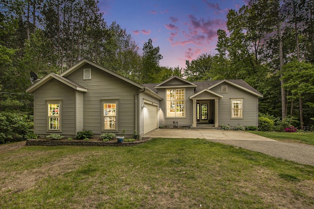 16448 Van Wagoner Rd, Spring Lake, MI 49456 - view of front of house featuring driveway, a garage, and a front lawn