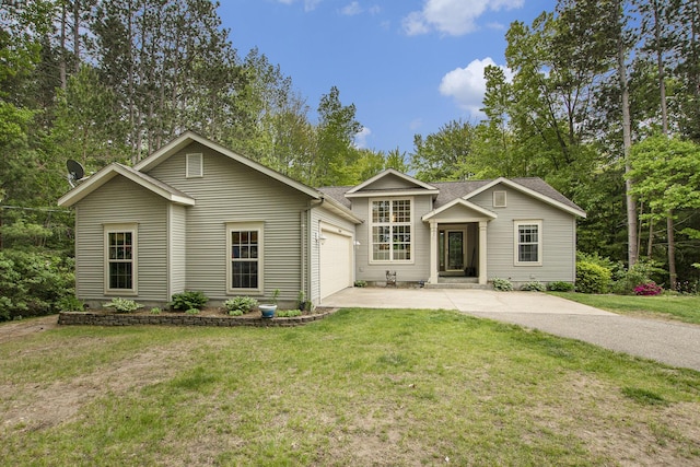 16448 Van Wagoner Rd, Spring Lake, MI 49456 - view of front facade with driveway, a garage, and a front yard