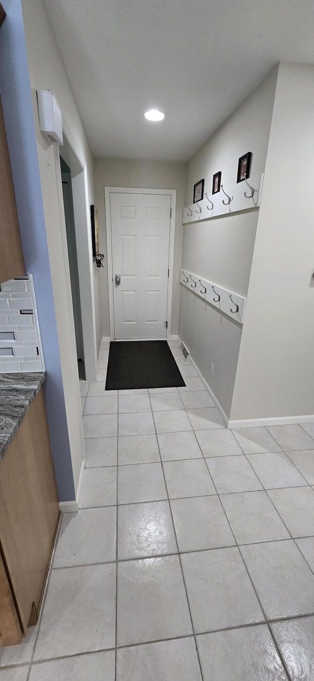 16448 Van Wagoner Rd, Spring Lake, MI 49456 - doorway featuring light tile patterned floors, baseboards, and recessed lighting