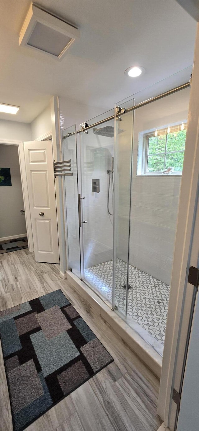 16448 Van Wagoner Rd, Spring Lake, MI 49456 - bathroom with a shower stall and wood finished floors