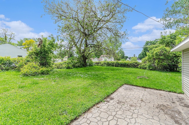 12023 Norborne, Redford, MI 48239 - view of grassy yard featuring a patio