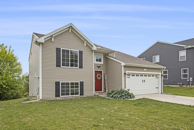 207 Station Hill St, Galesburg, MI 49053 - view of front facade featuring an attached garage, a front yard, and driveway