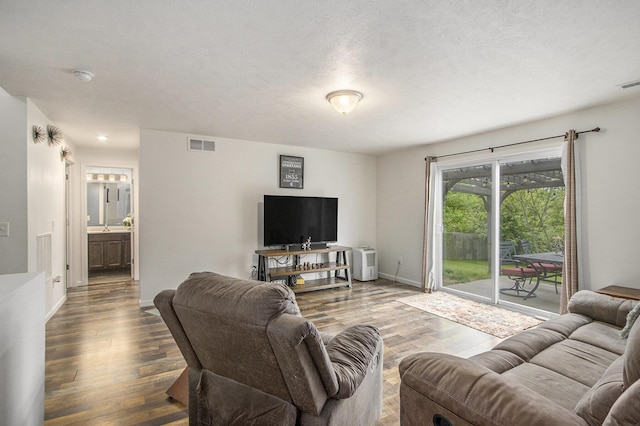 207 Station Hill St, Galesburg, MI 49053 - living area with wood finished floors and baseboards