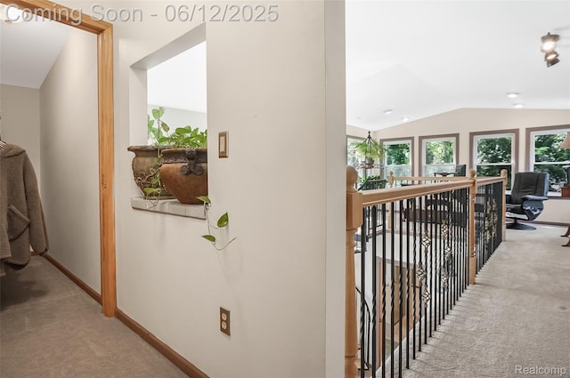 1140 W Lemont Ct, Canton, MI 48187 - hall with carpet, lofted ceiling, baseboards, and an upstairs landing