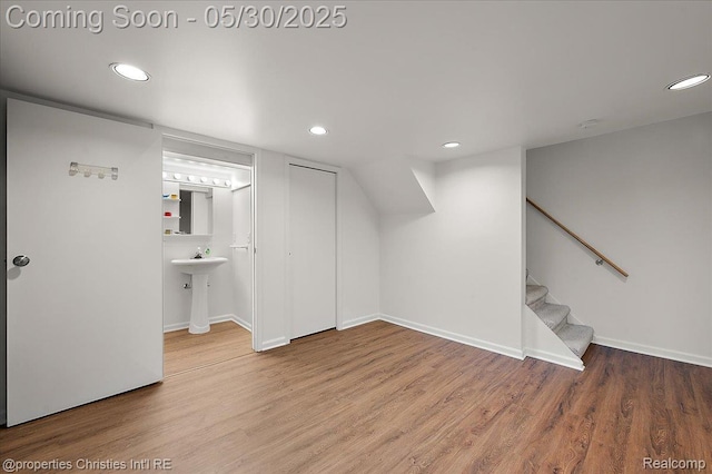 731 N Eton St, Birmingham, MI 48009 - bonus room with recessed lighting, wood finished floors, stairway, and baseboards
