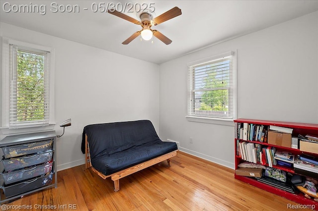 731 N Eton St, Birmingham, MI 48009 - sitting room with baseboards, wood finished floors, and a ceiling fan