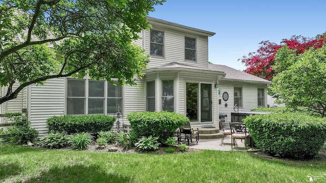 6757 Lockmill Rd, Temperance, MI 48182 - view of front of house featuring a patio area and a front yard