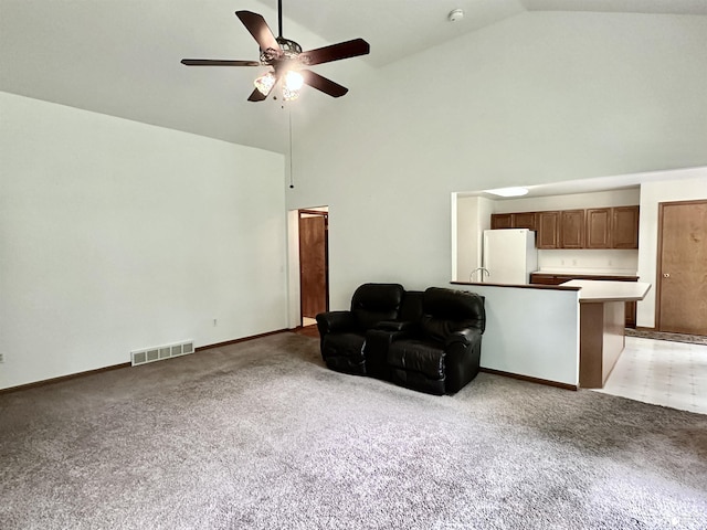6757 Lockmill Rd, Temperance, MI 48182 - living area featuring high vaulted ceiling, ceiling fan, light carpet, and baseboards