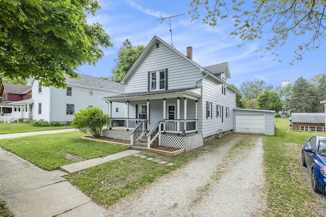 49 S Arthur St, Grant, MI 49327 - view of front facade featuring a porch, an outbuilding, a chimney, driveway, and a front lawn