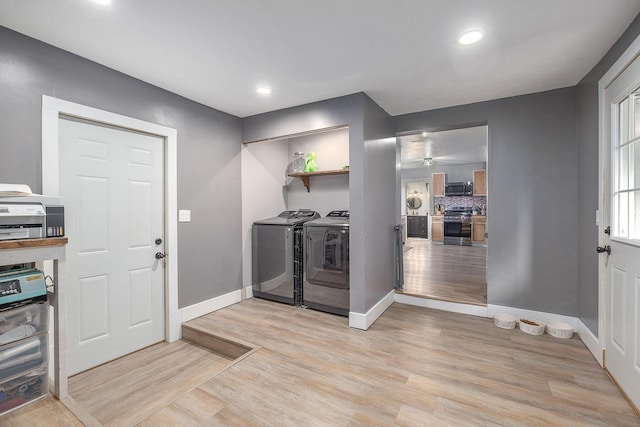 49 S Arthur St, Grant, MI 49327 - washroom with washer and dryer, light wood-type flooring, baseboards, and recessed lighting