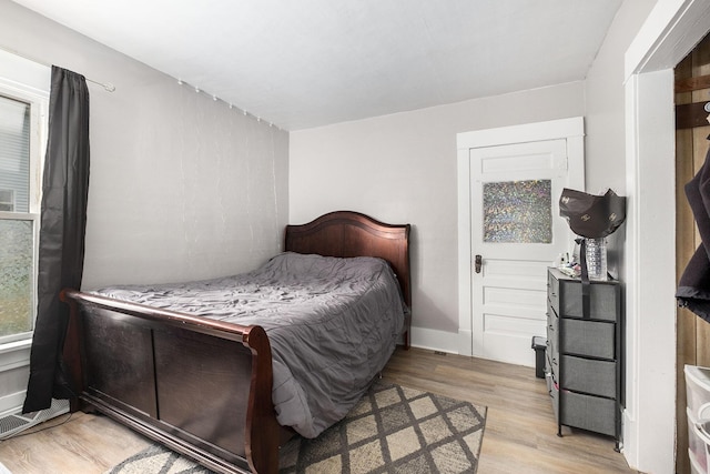 49 S Arthur St, Grant, MI 49327 - bedroom with light wood-type flooring