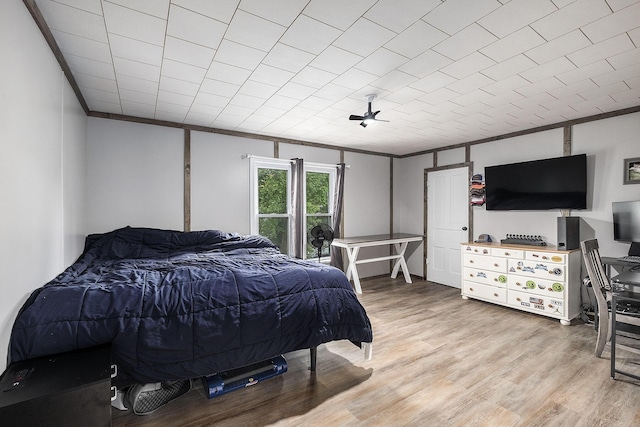 49 S Arthur St, Grant, MI 49327 - bedroom with crown molding and wood finished floors
