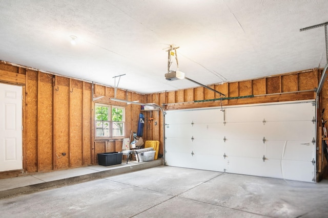 5540 Koster Dr SW, Wyoming, MI 49418 - garage with a garage door opener