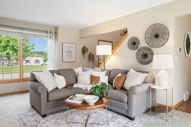 5540 Koster Dr SW, Wyoming, MI 49418 - carpeted living room featuring baseboards
