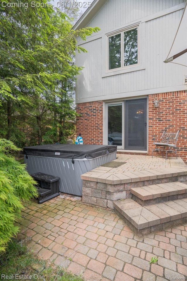 39888 Brylor, Clinton Township, MI 48038 - view of patio / terrace featuring a hot tub