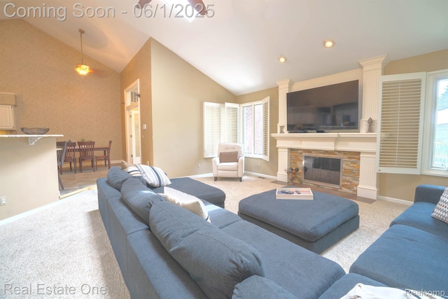 39888 Brylor, Clinton Township, MI 48038 - carpeted living area with lofted ceiling, baseboards, a stone fireplace, and recessed lighting