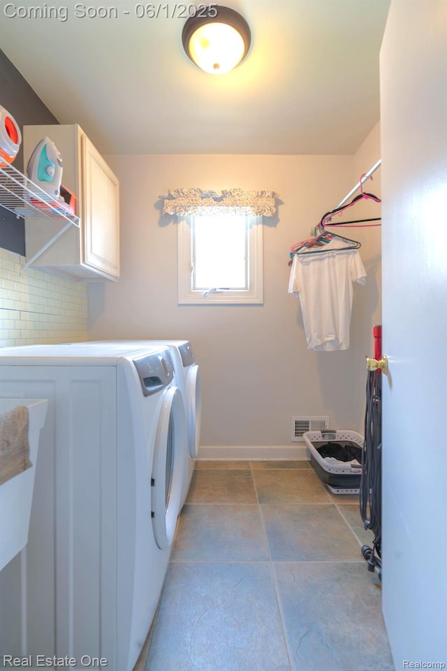 39888 Brylor, Clinton Township, MI 48038 - washroom featuring cabinet space, washer and clothes dryer, and baseboards