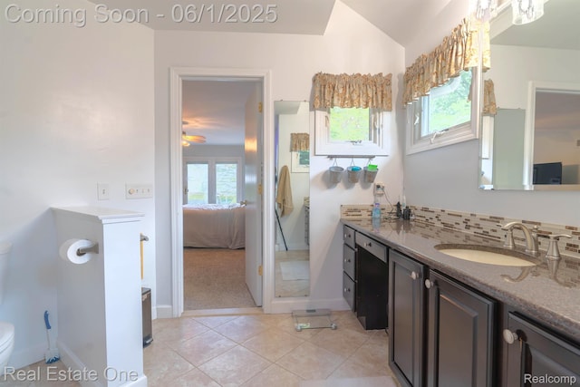 39888 Brylor, Clinton Township, MI 48038 - full bath with vanity, ensuite bath, tasteful backsplash, toilet, and tile patterned flooring