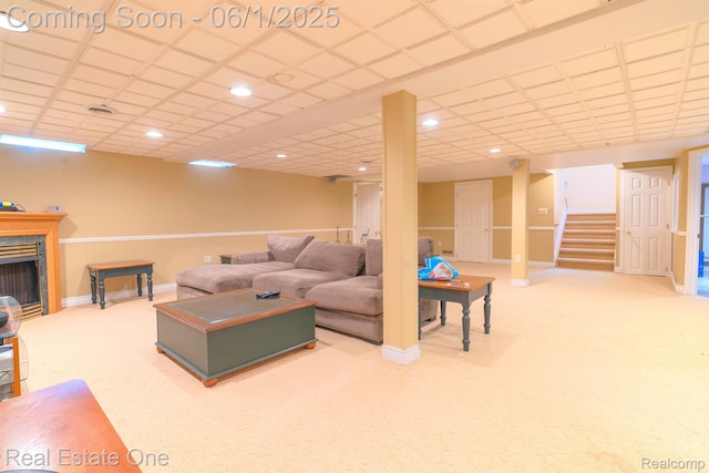 39888 Brylor, Clinton Township, MI 48038 - carpeted living area featuring baseboards, stairway, recessed lighting, and a high end fireplace
