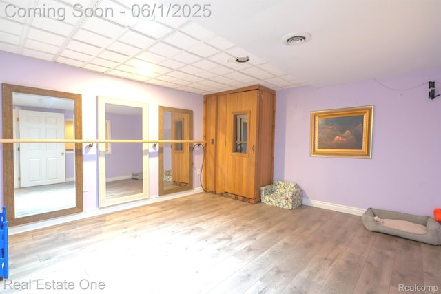 39888 Brylor, Clinton Township, MI 48038 - spare room featuring baseboards and wood finished floors