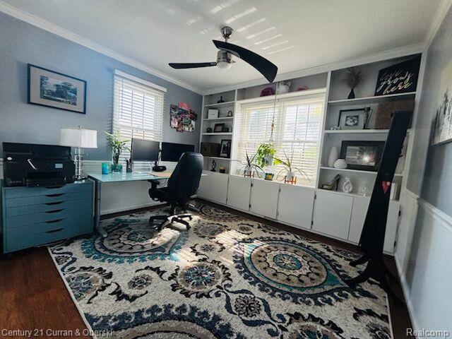 45215 Custer Ave, Utica, MI 48317 - office area featuring ornamental molding, ceiling fan, built in shelves, and wood finished floors