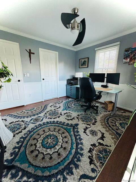 45215 Custer Ave, Utica, MI 48317 - home office with ornamental molding, a ceiling fan, and wood finished floors