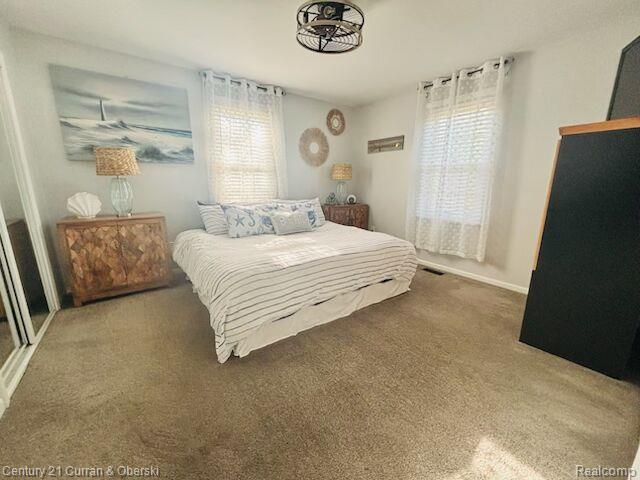45215 Custer Ave, Utica, MI 48317 - bedroom featuring carpet and baseboards