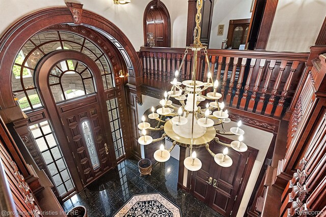 975 Sunningdale Dr, Bloomfield Hills, MI 48302 - foyer entrance featuring granite tiled floors, a chandelier, and a towering ceiling