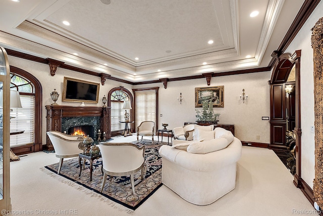 975 Sunningdale Dr, Bloomfield Hills, MI 48302 - living room with carpet floors, a tray ceiling, a premium fireplace, crown molding, and baseboards