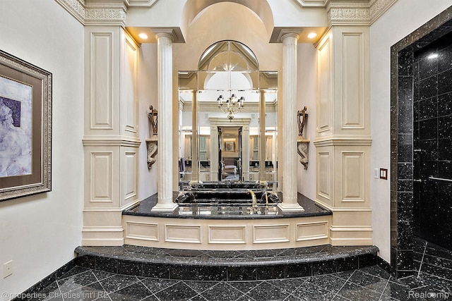 975 Sunningdale Dr, Bloomfield Hills, MI 48302 - bathroom featuring granite floors, ornate columns, inlaid floor details, and crown molding