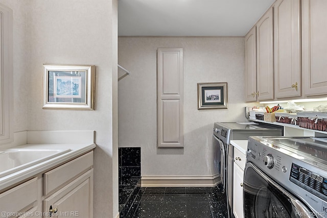 975 Sunningdale Dr, Bloomfield Hills, MI 48302 - washroom with washing machine and dryer, baseboards, and cabinet space