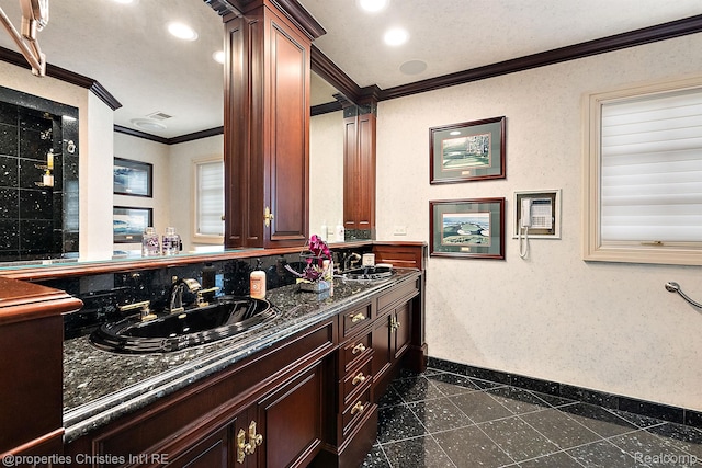 975 Sunningdale Dr, Bloomfield Hills, MI 48302 - bathroom with crown molding, baseboards, granite tiled floors, double vanity, and recessed lighting