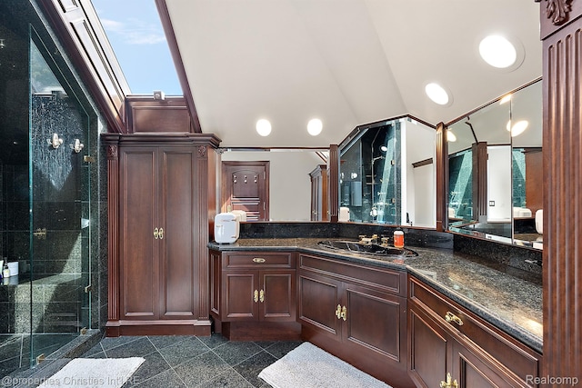 975 Sunningdale Dr, Bloomfield Hills, MI 48302 - full bathroom with granite tiled floors, a stall shower, vanity, and lofted ceiling