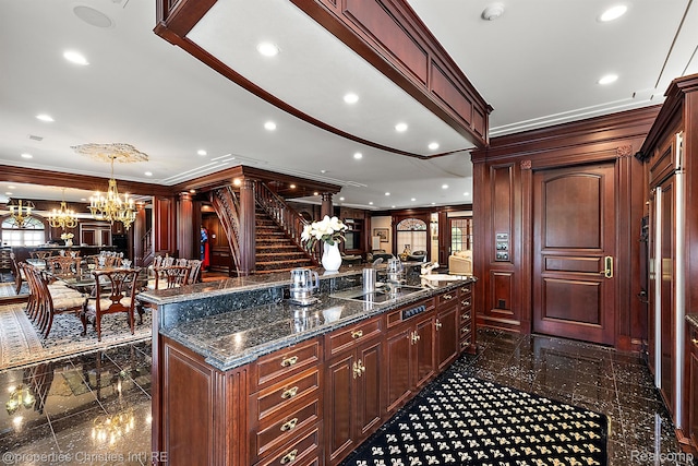 975 Sunningdale Dr, Bloomfield Hills, MI 48302 - kitchen featuring granite tiled floors, crown molding, a chandelier, a large island, and recessed lighting