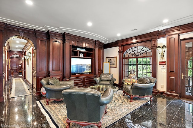 975 Sunningdale Dr, Bloomfield Hills, MI 48302 - living area with granite floors, crown molding, baseboards, arched walkways, and recessed lighting