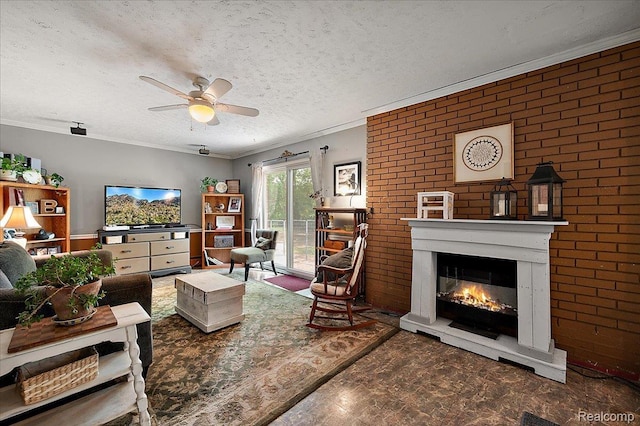 335 Douglas Dr, Bloomfield Hills, MI 48304 - living area with ceiling fan, a glass covered fireplace, crown molding, brick wall, and a textured ceiling