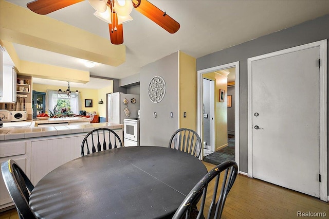 335 Douglas Dr, Bloomfield Hills, MI 48304 - dining room with a ceiling fan, wood finished floors, and a chandelier