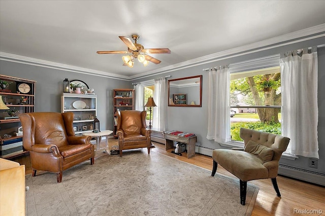 335 Douglas Dr, Bloomfield Hills, MI 48304 - living area featuring ornamental molding, wood finished floors, a ceiling fan, and a baseboard radiator