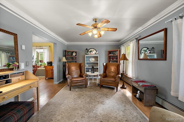 335 Douglas Dr, Bloomfield Hills, MI 48304 - sitting room featuring a baseboard radiator, wood finished floors, ceiling fan, and crown molding