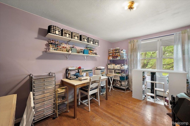 335 Douglas Dr, Bloomfield Hills, MI 48304 - home office with wood finished floors and a textured ceiling