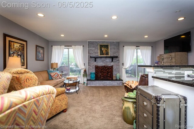1975 Chancery Dr, Troy, MI 48085 - living area with carpet floors, recessed lighting, and a fireplace
