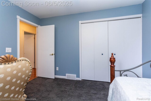 1975 Chancery Dr, Troy, MI 48085 - carpeted bedroom featuring a closet and baseboards
