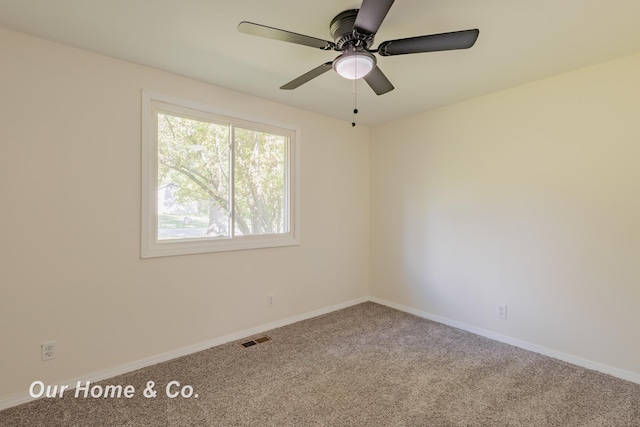 838 S Grey Rd, Midland, MI 48640 - carpeted spare room with baseboards and ceiling fan