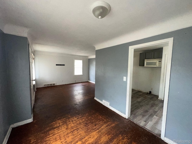 8068 Stahelin Ave, Detroit, MI 48228 - empty room featuring wood finished floors and baseboards