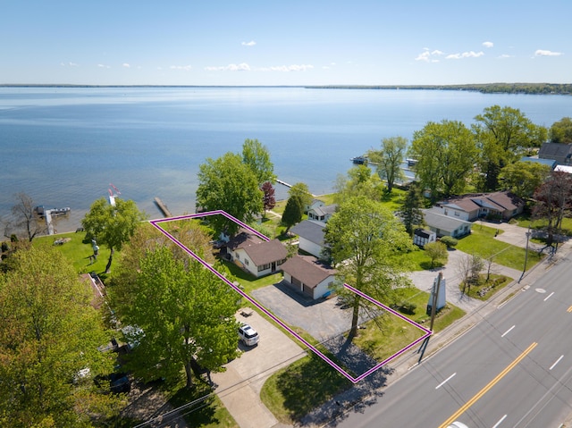 6132 W Houghton Lake Dr, Houghton Lake, MI 48629 - aerial overview of property's location with a large body of water and property parcel outlined