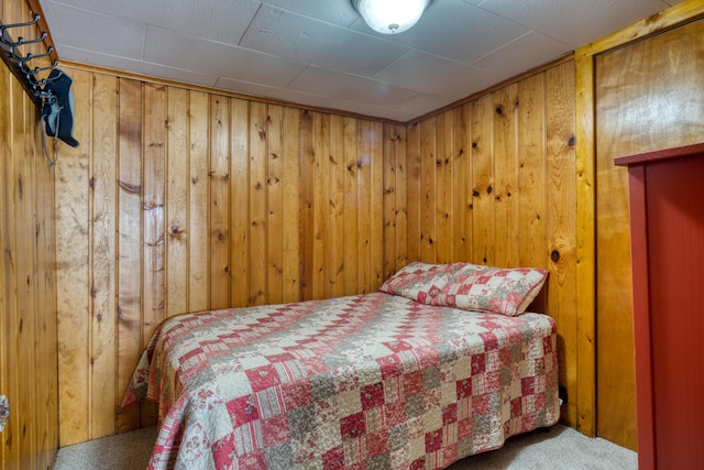 6132 W Houghton Lake Dr, Houghton Lake, MI 48629 - bedroom with carpet and wooden walls