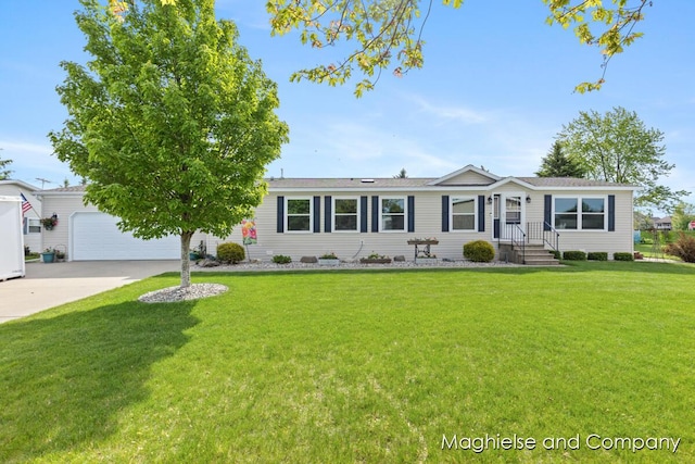7560 Derbyboro Dr Unit 315, Caledonia, MI 49316 - view of front of house with a garage, a front yard, and driveway