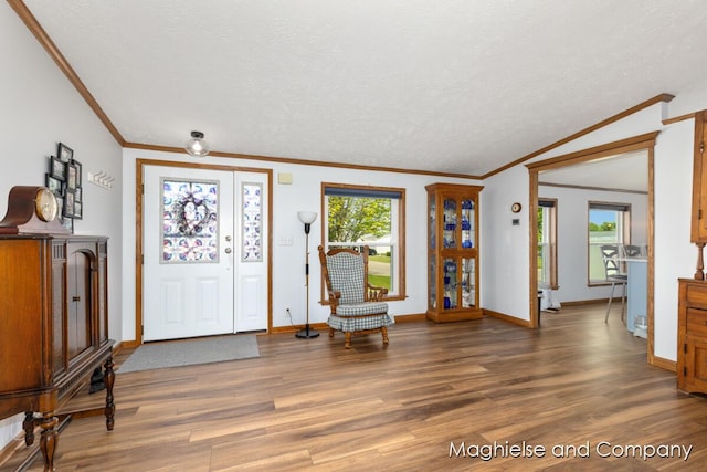7560 Derbyboro Dr Unit 315, Caledonia, MI 49316 - entrance foyer featuring ornamental molding, wood finished floors, a textured ceiling, and baseboards