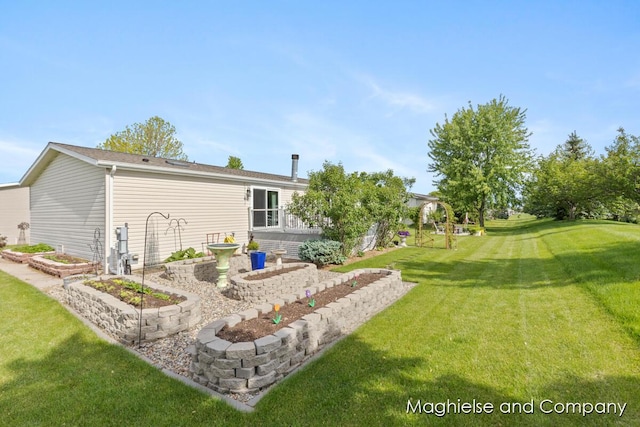7560 Derbyboro Dr Unit 315, Caledonia, MI 49316 - back of house with a yard
